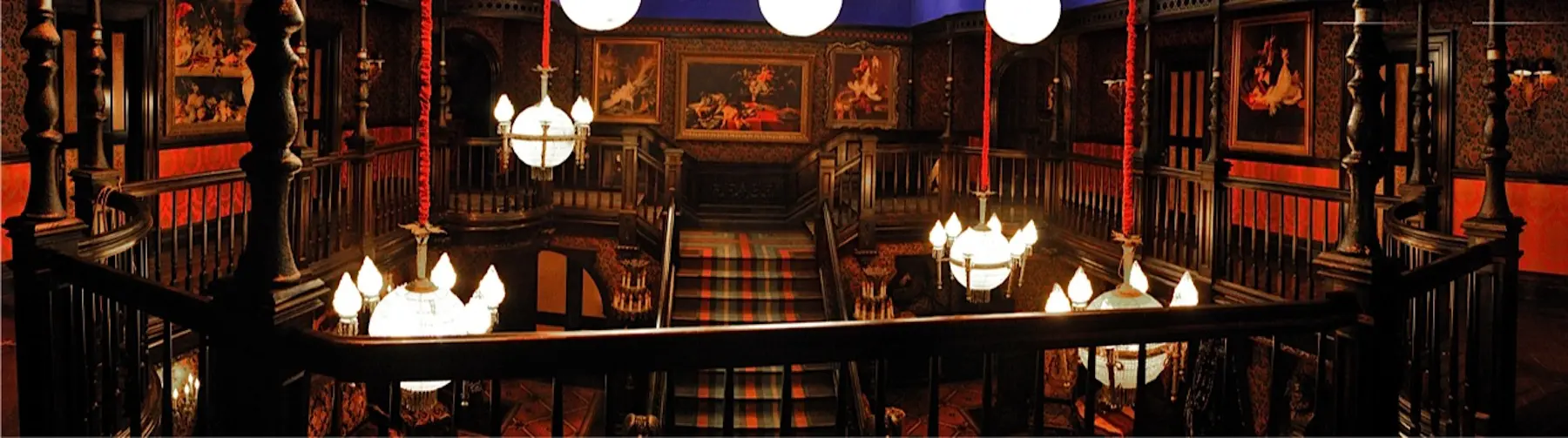 Elegant wooden staircase in dimly lit interior