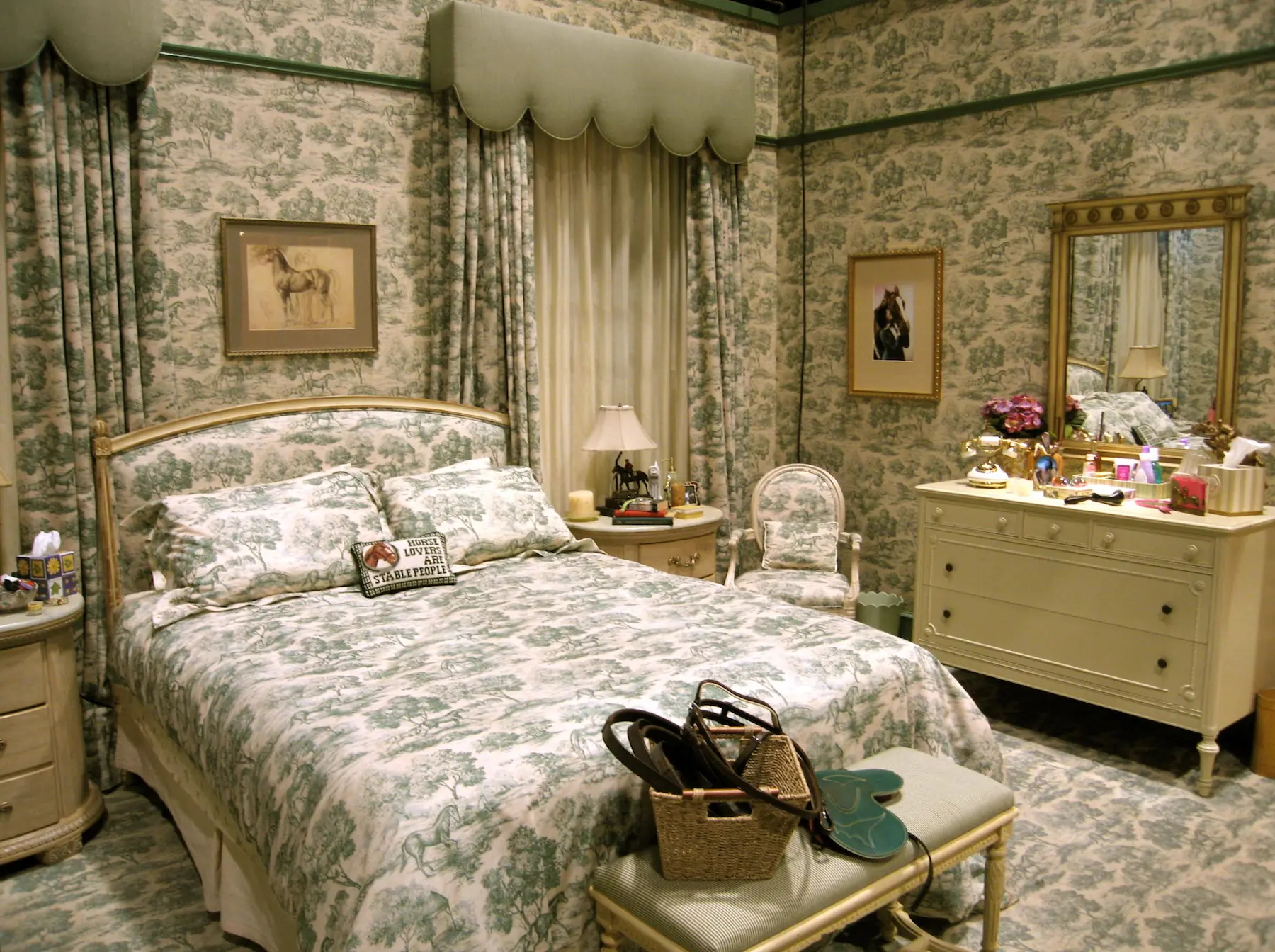 Vintage-style bedroom with patterned wallpaper