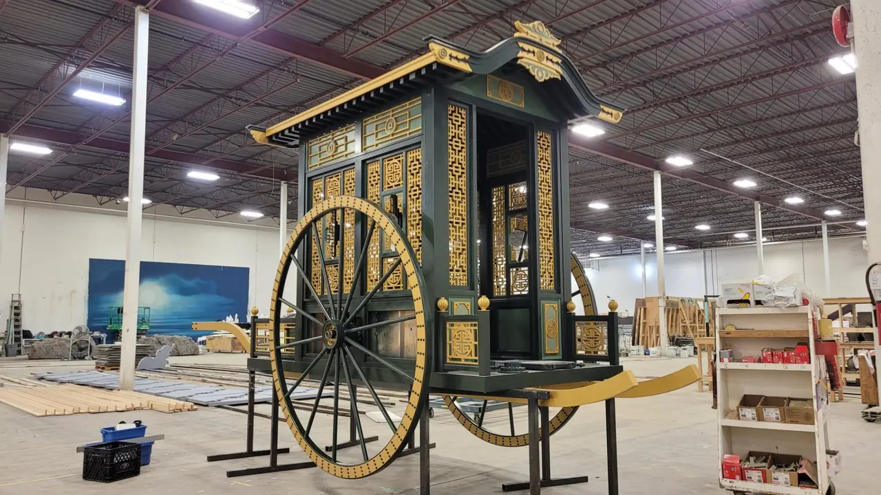 Ornate historical cart display indoors